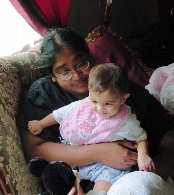 Amira at six months old with me in MN